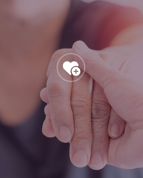 Woman holding other woman's hand